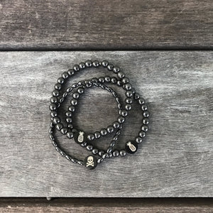 Hematite Solo Stretch Bracelet with Logo Flip Coin